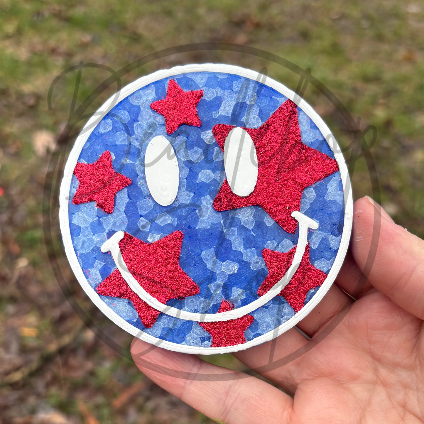 Shaken Blue Smiley with Red Stars Freshie